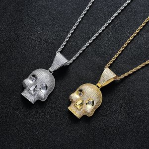 Skull pendant set with zircon stones, product photo from the seller